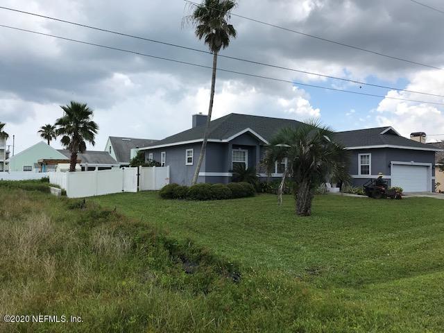 301 Twenty Second Street St. Augustine, FL 32084 - Photo 3 of 25 a front view of a house with garden