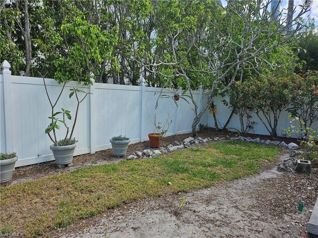 835 9th Avenue South Naples, FL 34102 - Photo 12 of 13 FENCED IN BACKYARD