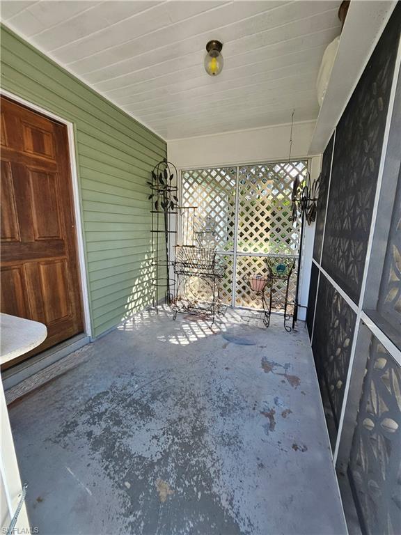 835 9th Avenue South Naples, FL 34102 - Photo 2 of 13 SCREENED IN ENTRY PORCH