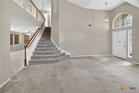 a view of an entryway with staircase