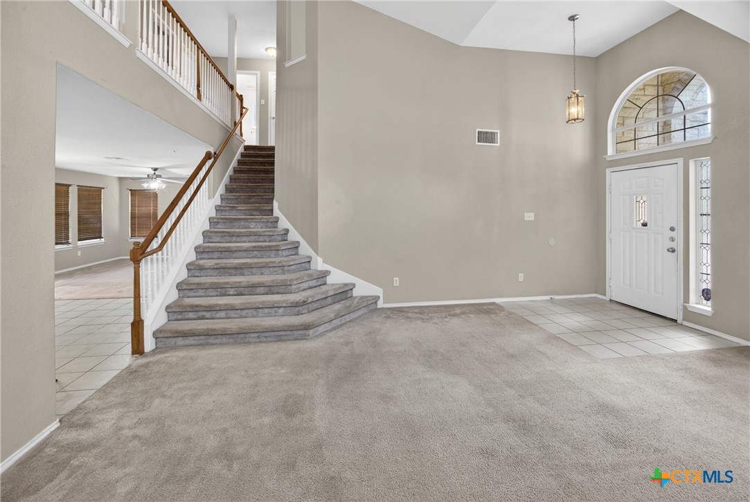 7015 Rickey Drive Temple, TX 76502 - Photo 6 of 29 a view of an entryway with staircase