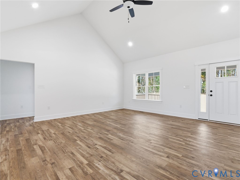 3706 Broad St Road Gum Spring, VA 23065 - Photo 12 of 34 a view of an empty room with wooden floor and a window