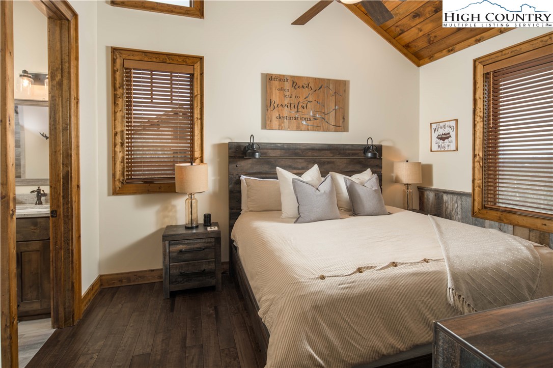 44 Camp Eagle Loop Banner Elk, NC 28604 - Photo 13 of 43 a bedroom with a bed and a window