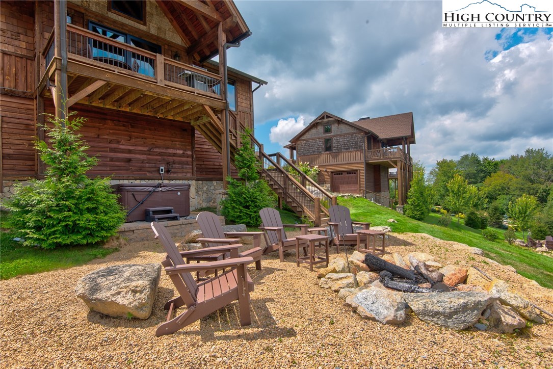 44 Camp Eagle Loop Banner Elk, NC 28604 - Photo 19 of 43 a backyard of a house with outdoor seating