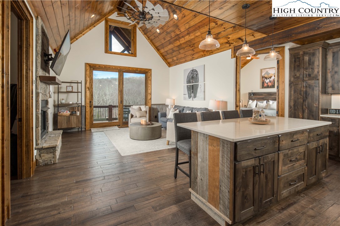 44 Camp Eagle Loop Banner Elk, NC 28604 - Photo 3 of 43 a kitchen with sink cabinets and wooden floor