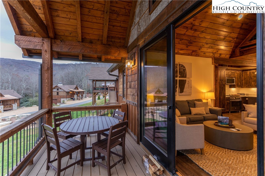44 Camp Eagle Loop Banner Elk, NC 28604 - Photo 33 of 43 a view of a chairs and table in the balcony