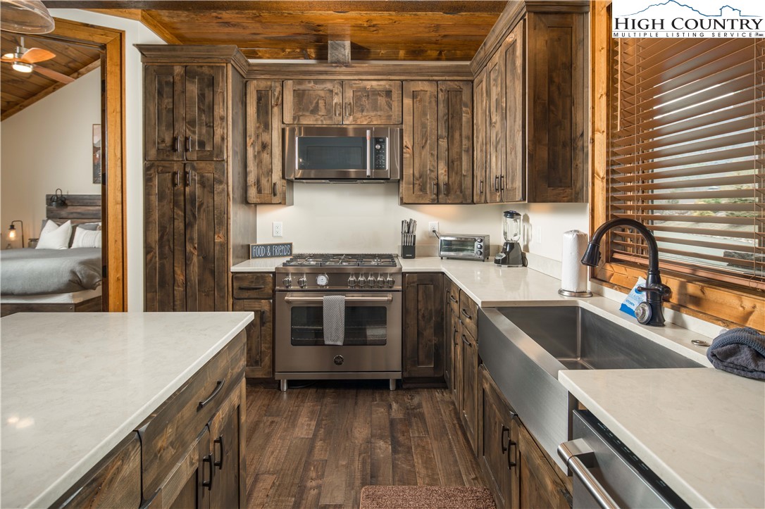 44 Camp Eagle Loop Banner Elk, NC 28604 - Photo 6 of 43 a kitchen that has a sink and a stove