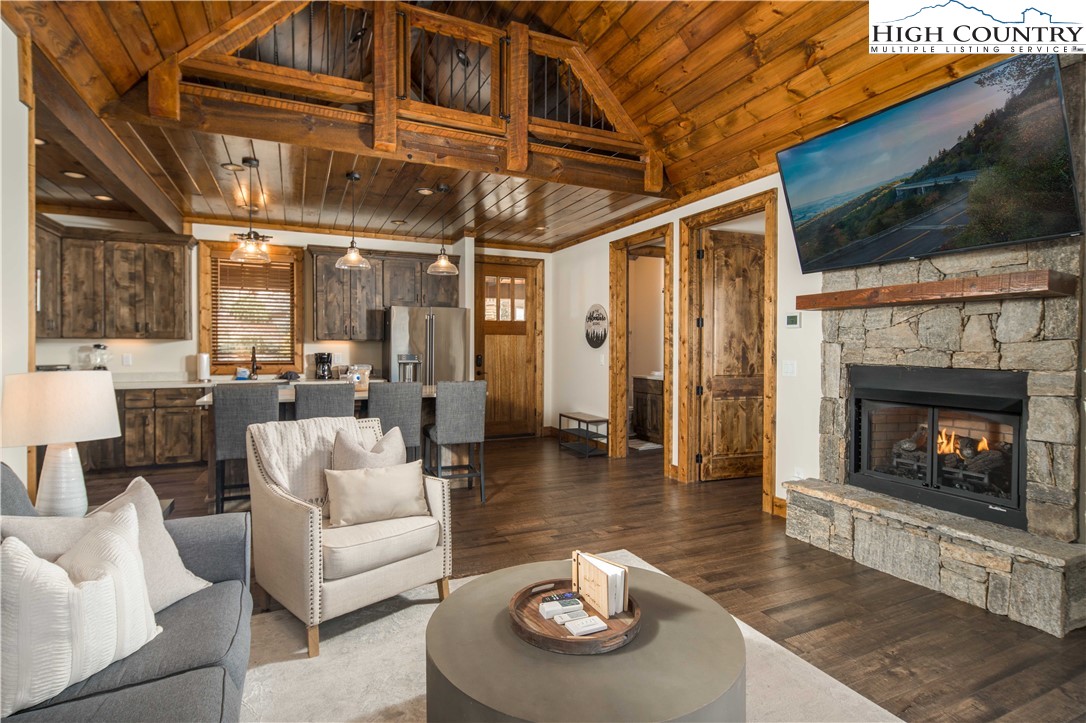 44 Camp Eagle Loop Banner Elk, NC 28604 - Photo 7 of 43 a living room with furniture and a fireplace
