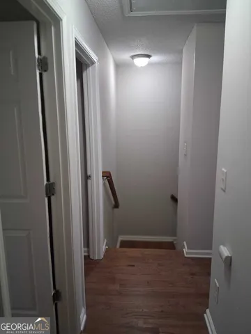 a bathroom with a shower and a sink