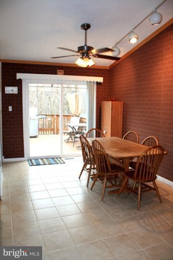 73 Haverhill Road Joppa, MD 21085 - Photo 2 of 30 a outdoor dining space with furniture and chandelier