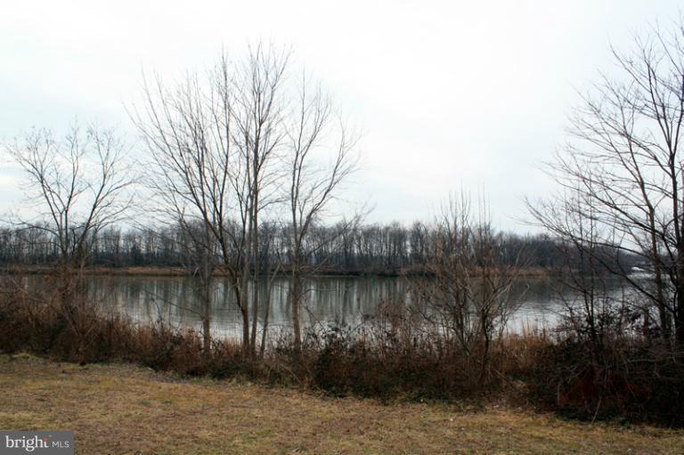 73 Haverhill Road Joppa, MD 21085 - Photo 20 of 30 a view of a lake with outdoor space