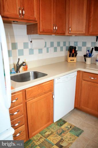 73 Haverhill Road Joppa, MD 21085 - Photo 24 of 30 a kitchen with a sink and cabinets