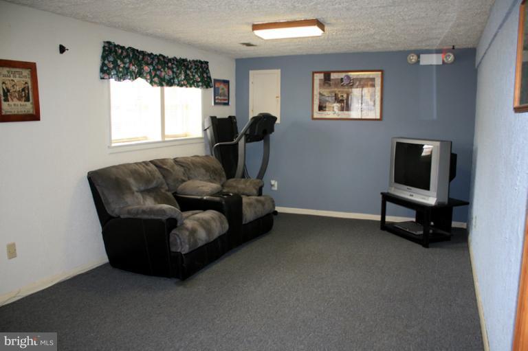 73 Haverhill Road Joppa, MD 21085 - Photo 27 of 30 a living room with furniture and a window