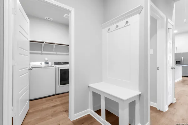 a utility room with dryer and washer