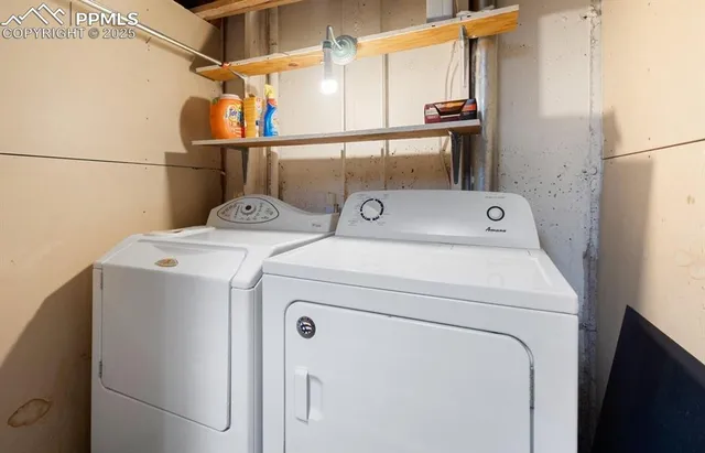 a utility room with dryer and washer