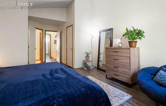 a bedroom with a bed and furniture