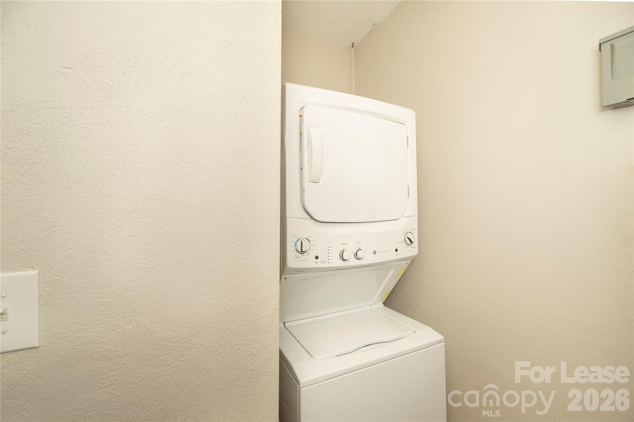 212 South Broad Street Brevard, NC 28712 - Photo 11 of 12 a utility room with dryer and washer
