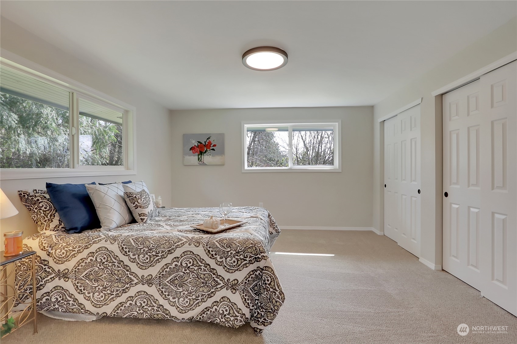 3400 Talbot Road South Renton, WA 98055 - Photo 13 of 35 a bedroom with a bed and a window
