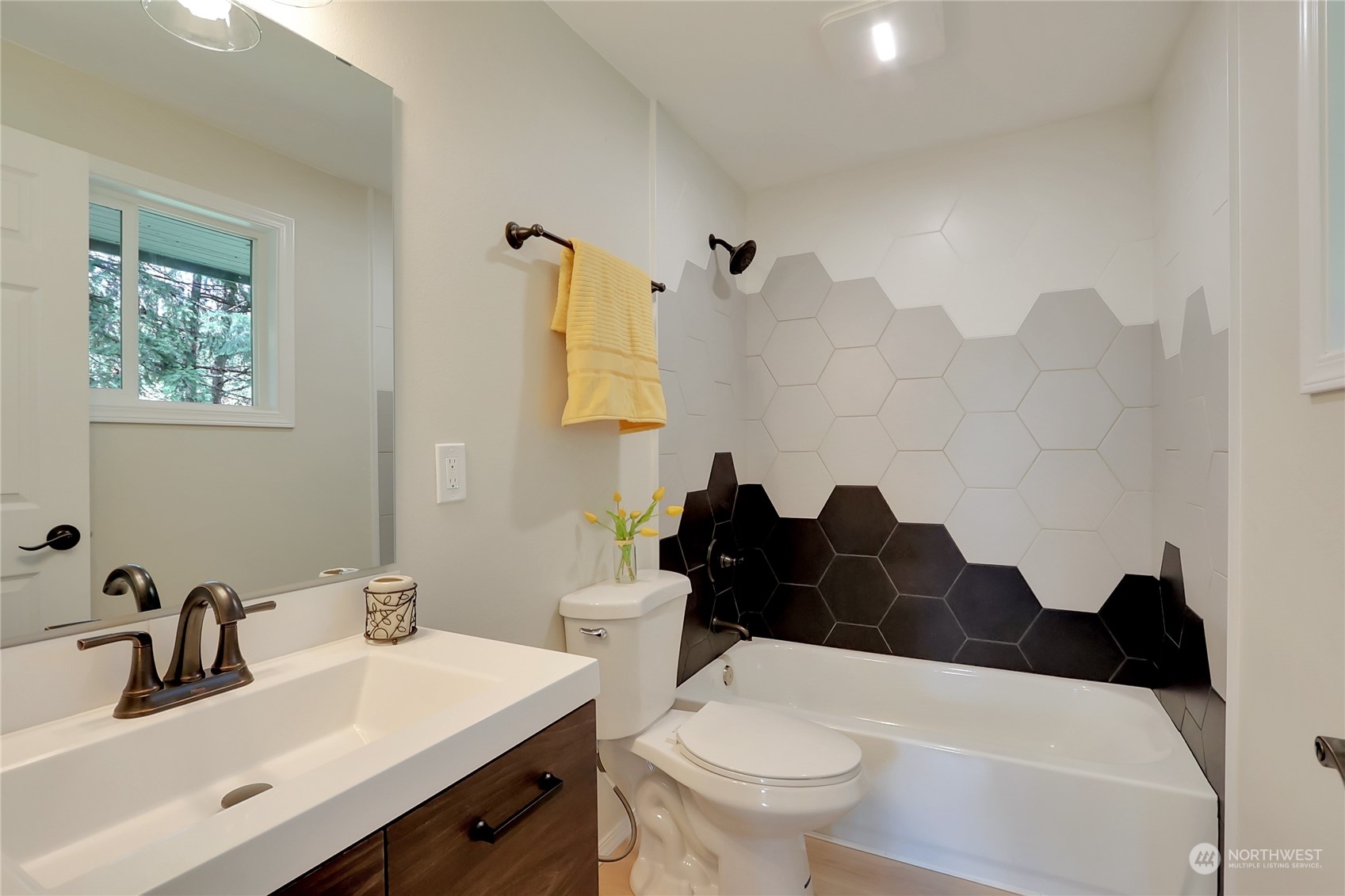 3400 Talbot Road South Renton, WA 98055 - Photo 14 of 35 a bathroom with a sink vanity mirror and toilet