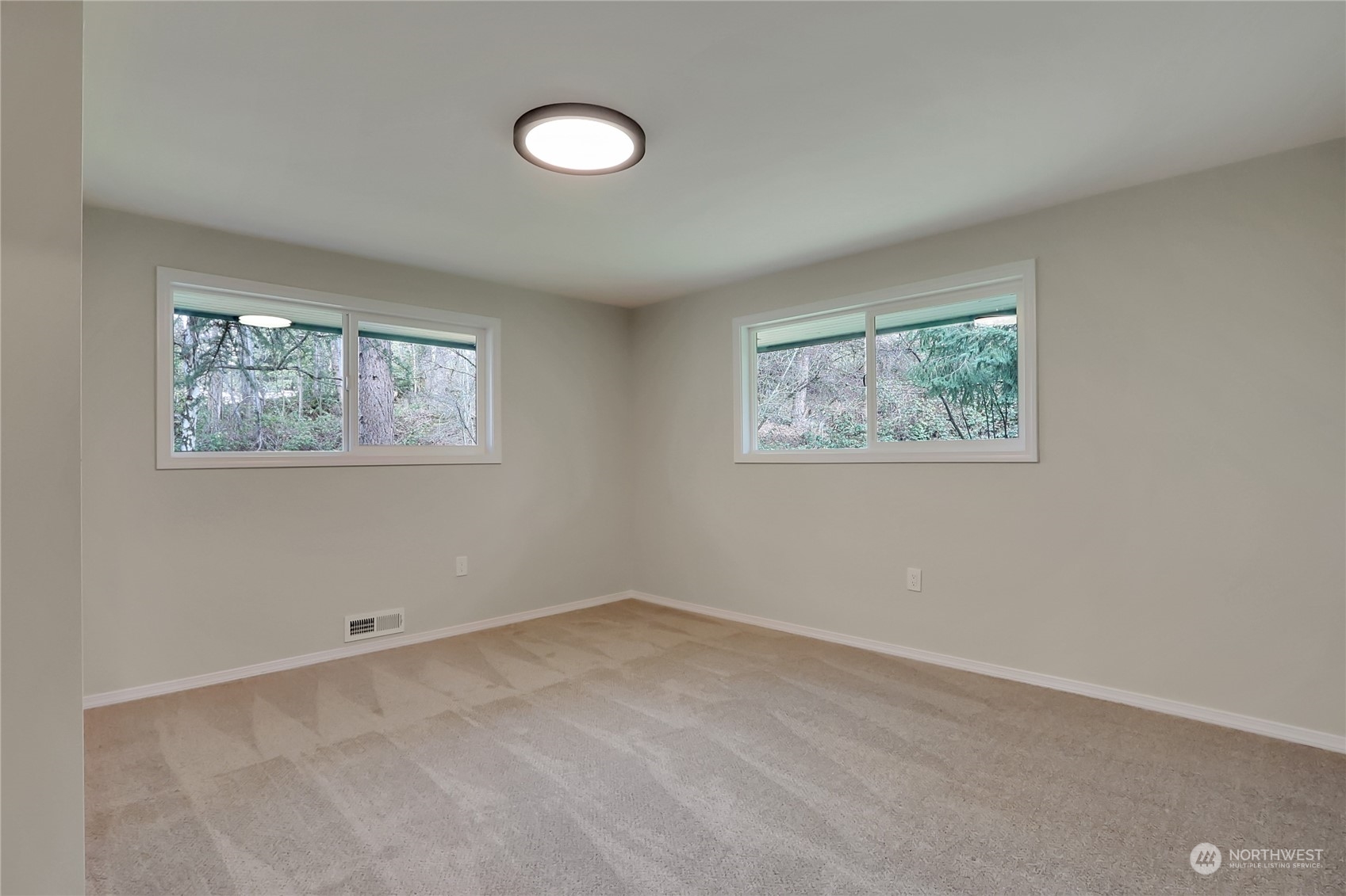 3400 Talbot Road South Renton, WA 98055 - Photo 15 of 35 a view of room with window and ceiling fan