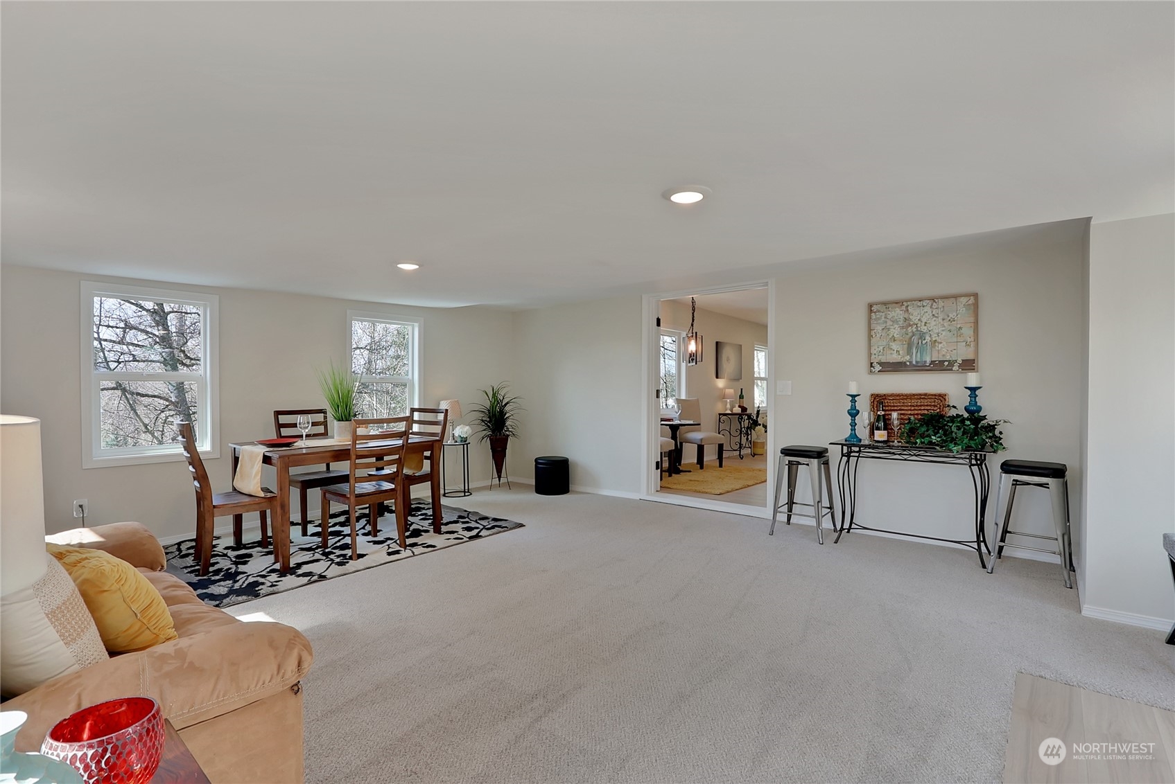 3400 Talbot Road South Renton, WA 98055 - Photo 18 of 35 a living room with furniture and a wooden floor