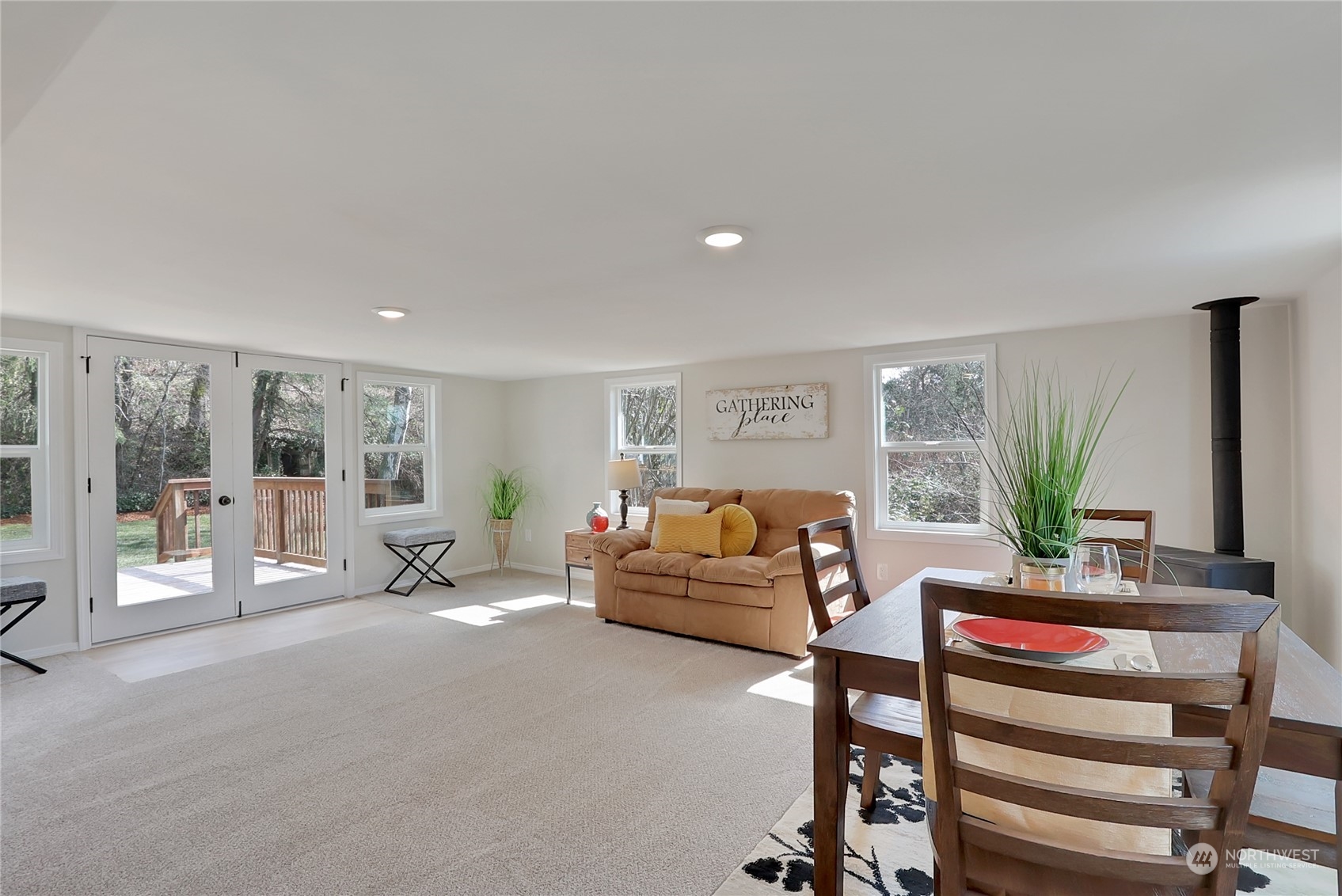 3400 Talbot Road South Renton, WA 98055 - Photo 19 of 35 a living room with furniture and large windows