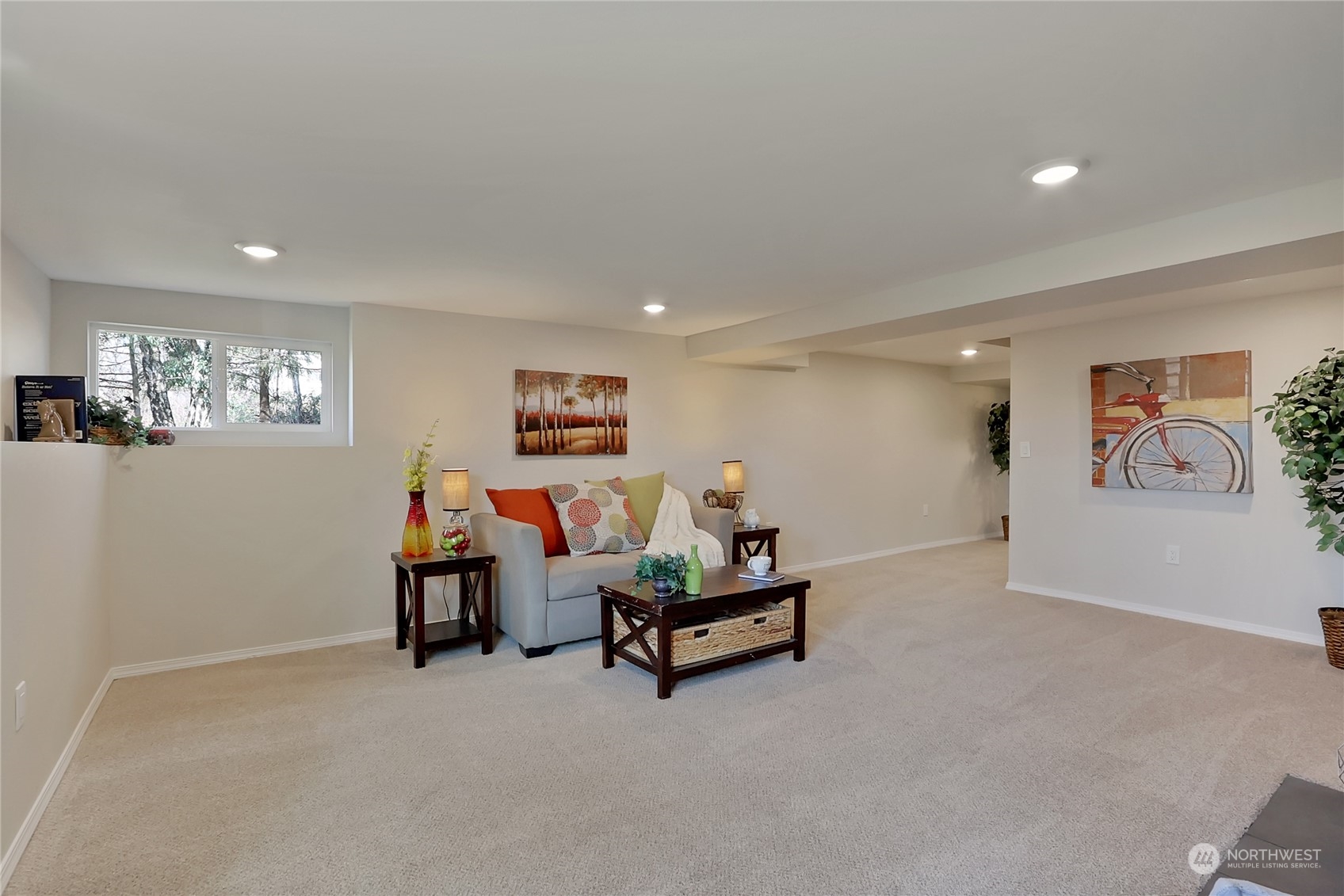 3400 Talbot Road South Renton, WA 98055 - Photo 25 of 35 a living room with furniture and a night stand