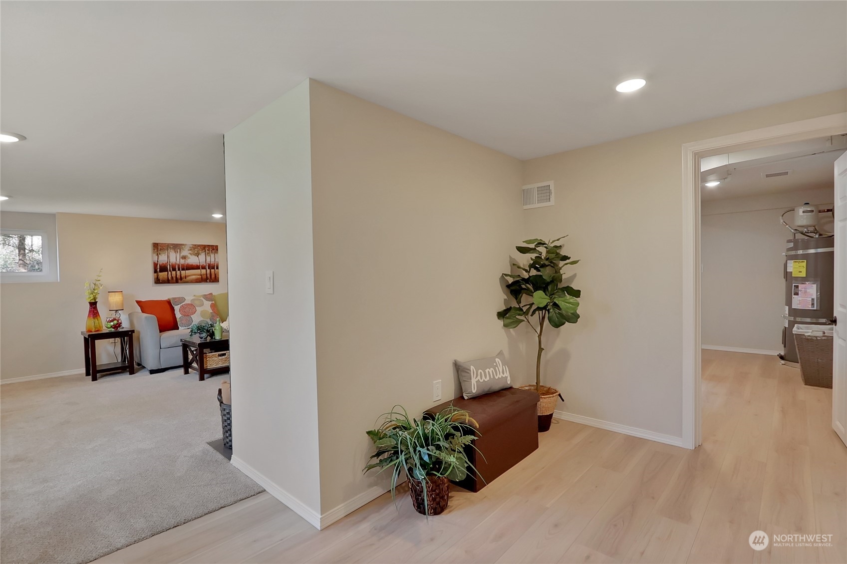 3400 Talbot Road South Renton, WA 98055 - Photo 26 of 35 a living room with furniture and a potted plant