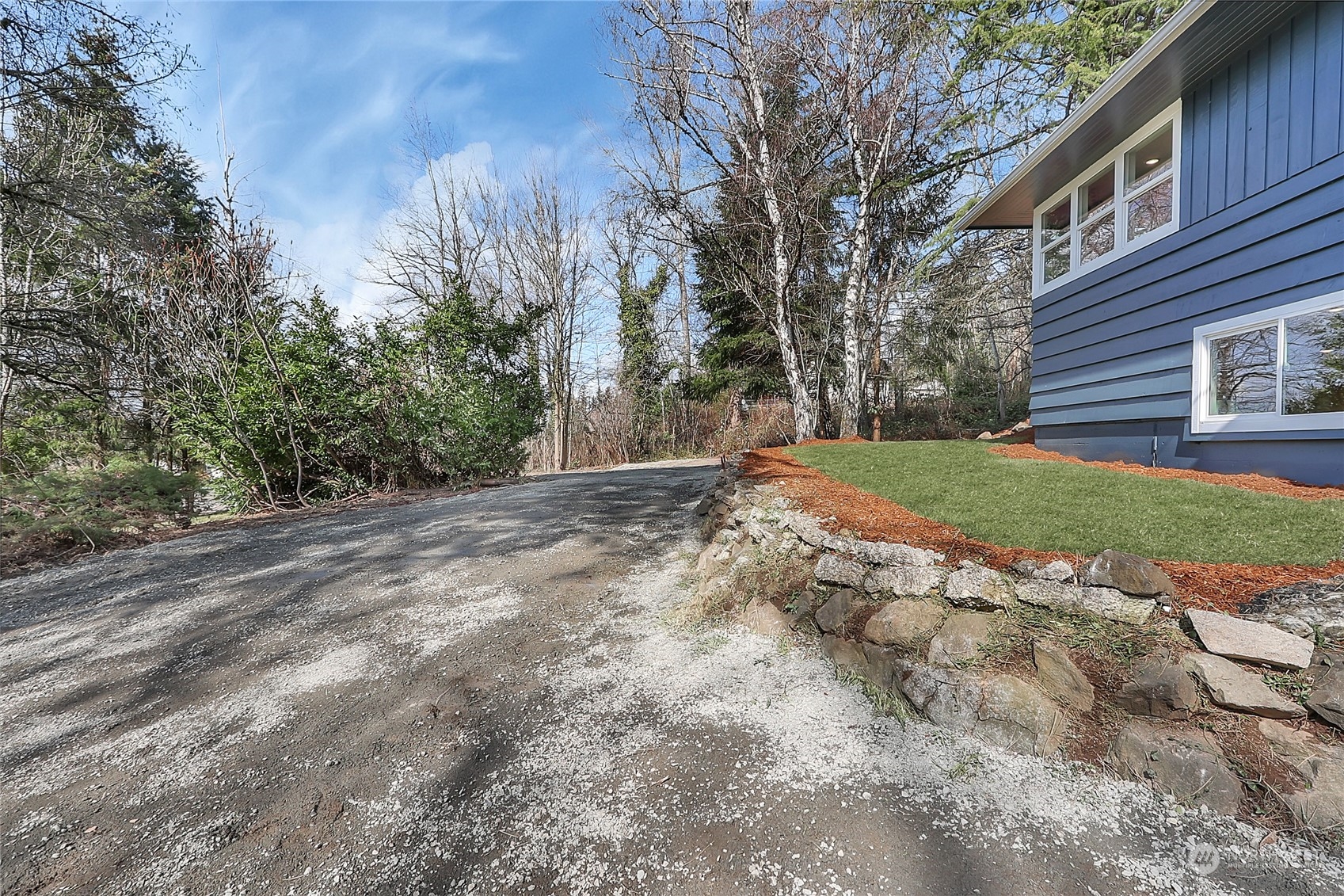 3400 Talbot Road South Renton, WA 98055 - Photo 29 of 35 a view of a yard with plants and trees