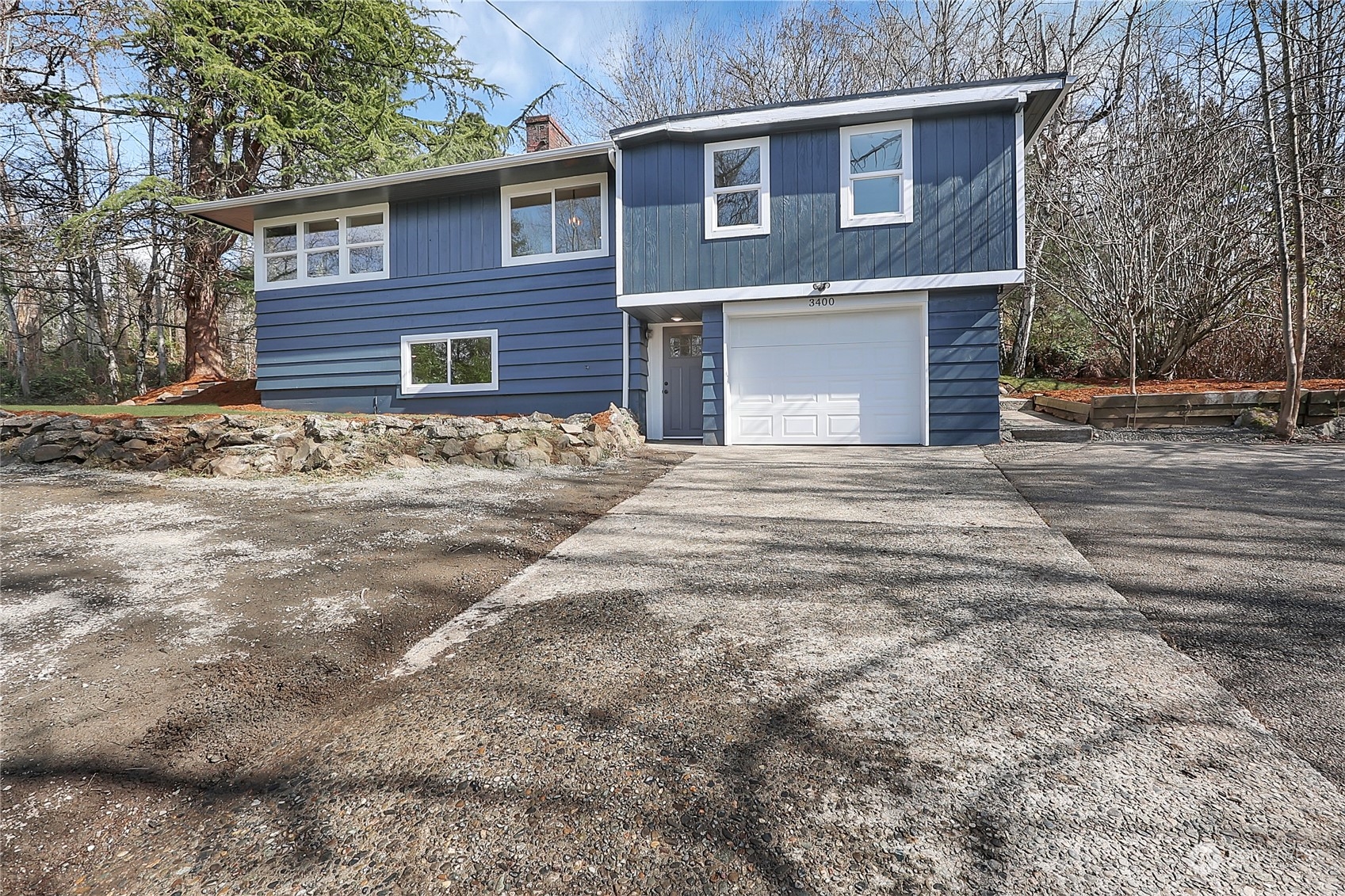 3400 Talbot Road South Renton, WA 98055 - Photo 30 of 35 a view of a house with a yard