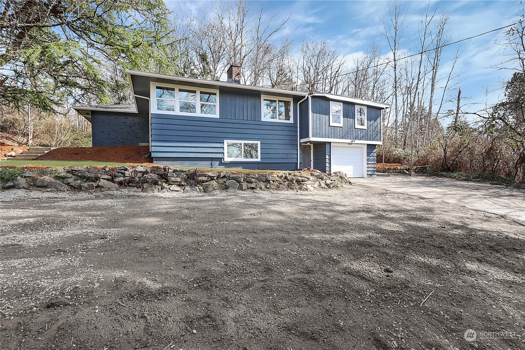 3400 Talbot Road South Renton, WA 98055 - Photo 31 of 35 a front view of a house with a yard