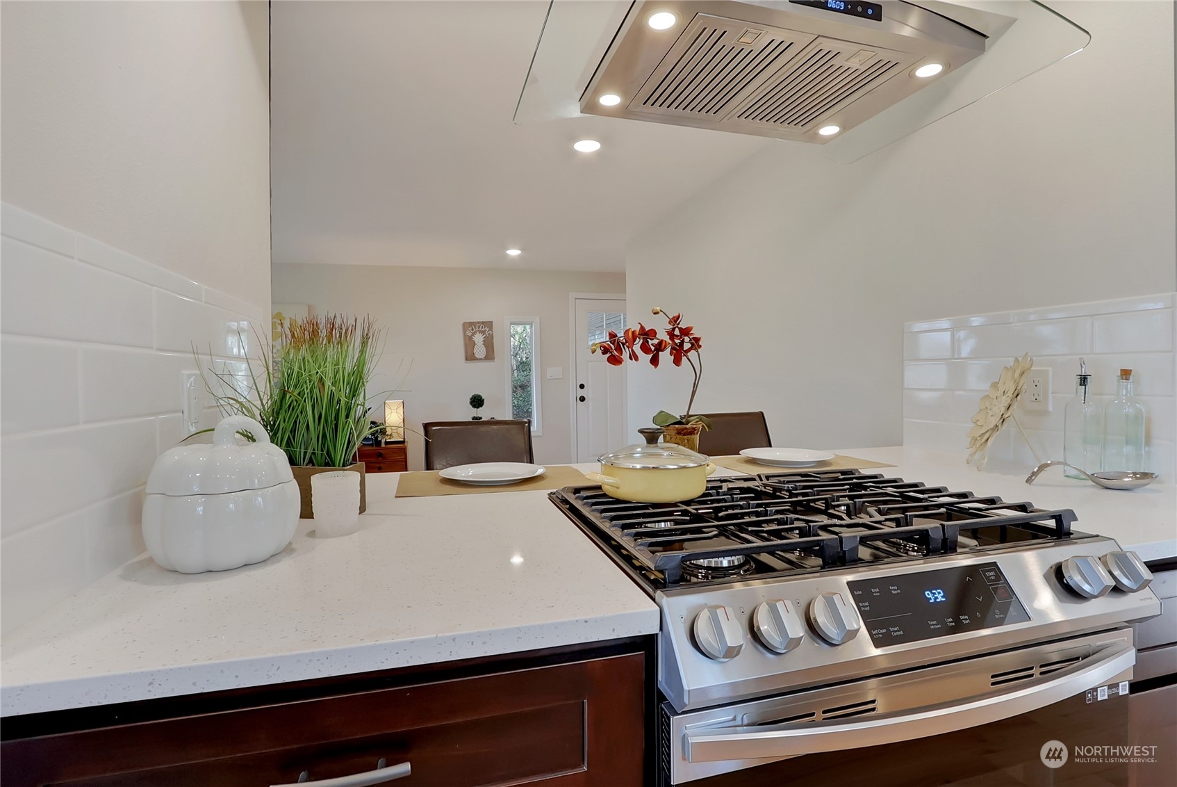 3400 Talbot Road South Renton, WA 98055 - Photo 8 of 35 a kitchen with a stove and a potted plant