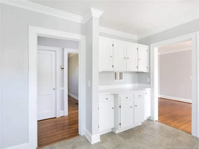 a bathroom with a bathtub and a toilet