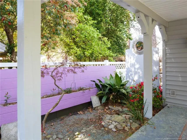 a view of a back yard of the house