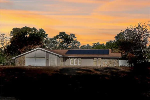a house view with a garden space