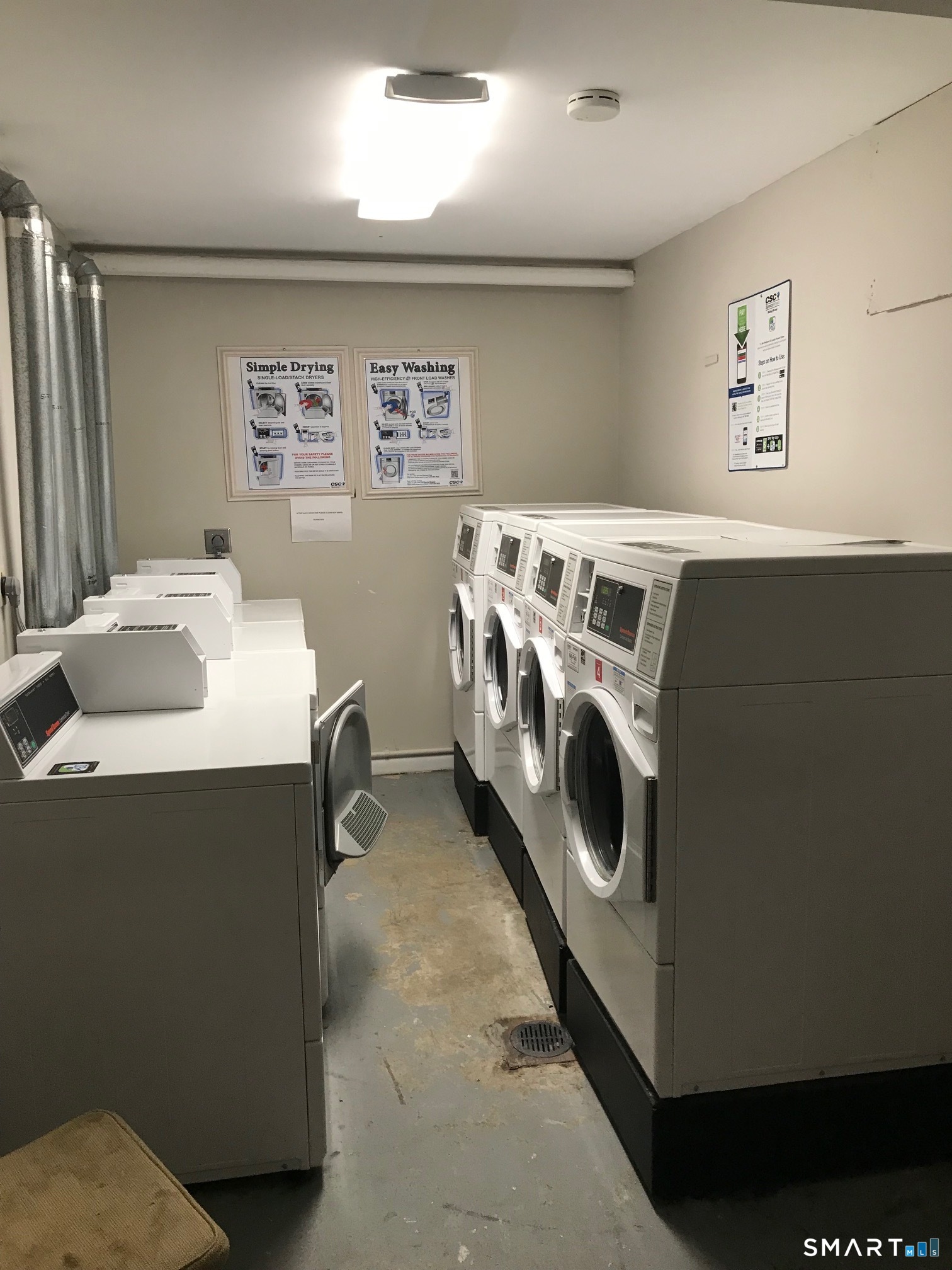 175 Mill Pond Road, Unit 346 Hamden, CT 06514 - Photo 16 of 18 a utility room with dryer and washer