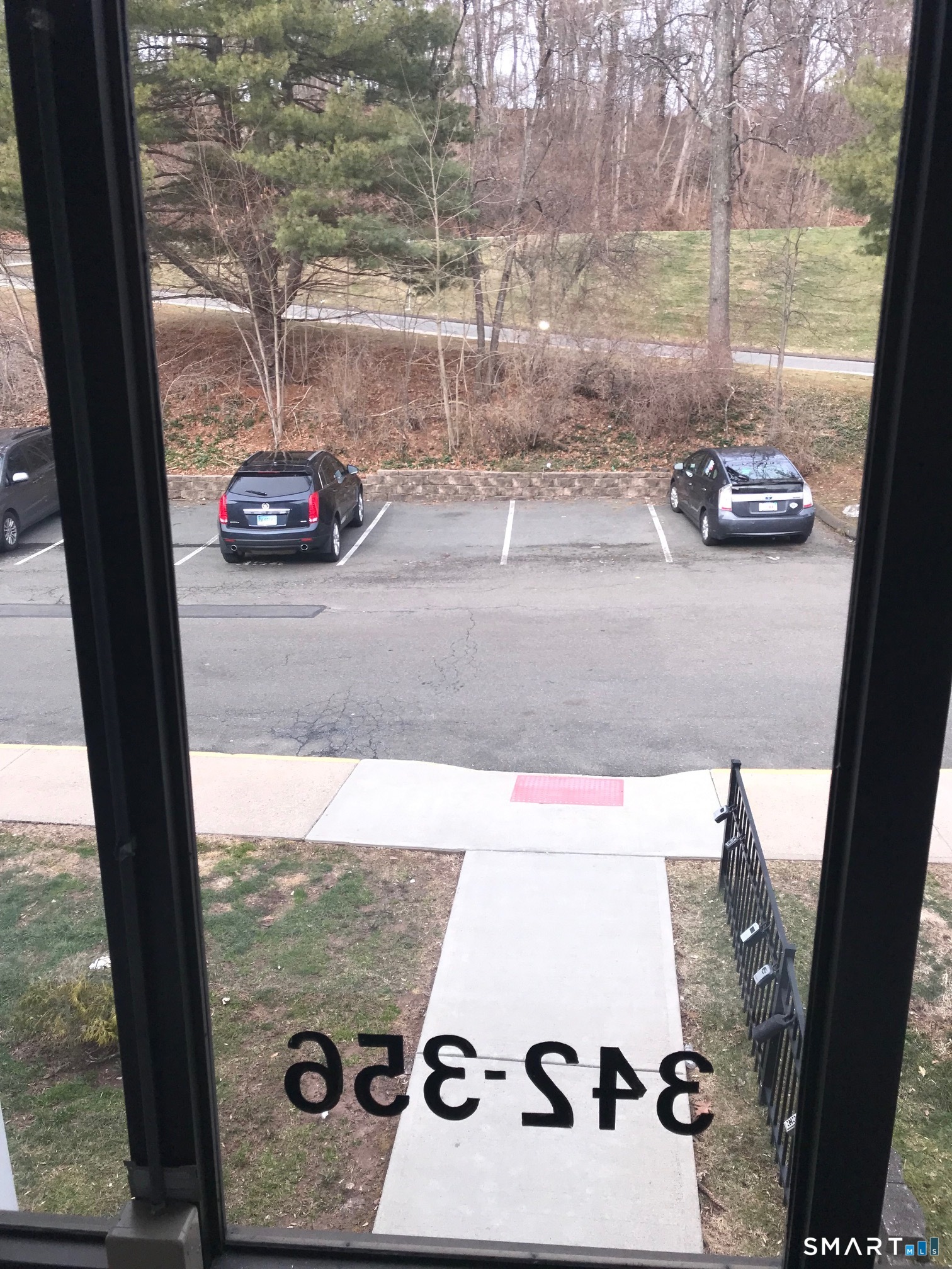 175 Mill Pond Road, Unit 346 Hamden, CT 06514 - Photo 4 of 18 a view of a floor to car window