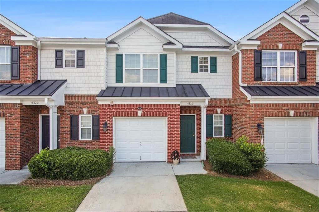 5322 Langston Road Norcross, GA 30071 - Photo 1 of 1 a front view of a house with a yard