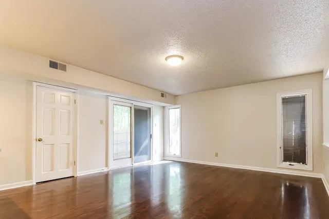 an empty room with windows