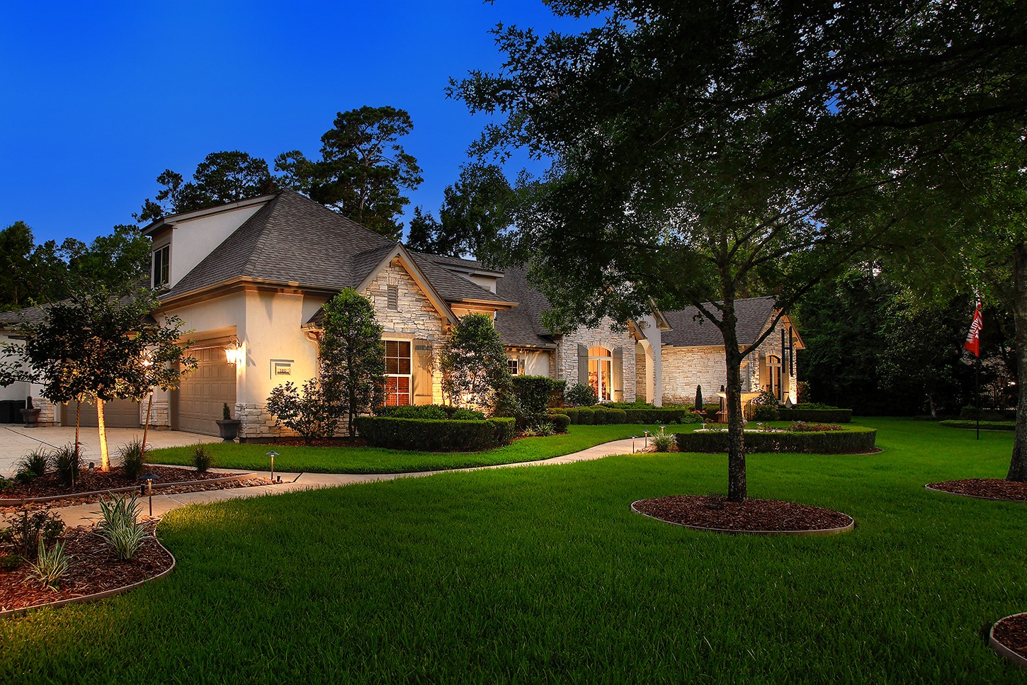 119 Angel Leaf Road The Woodlands, TX 77380 - Photo 3 of 50 a front view of a house with a yard
