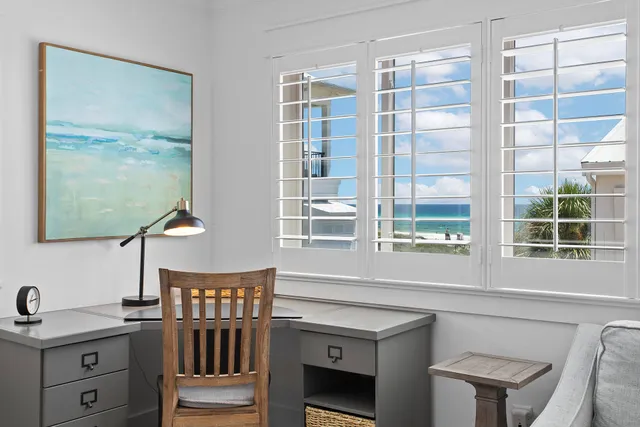 a bathroom with a sink and a window