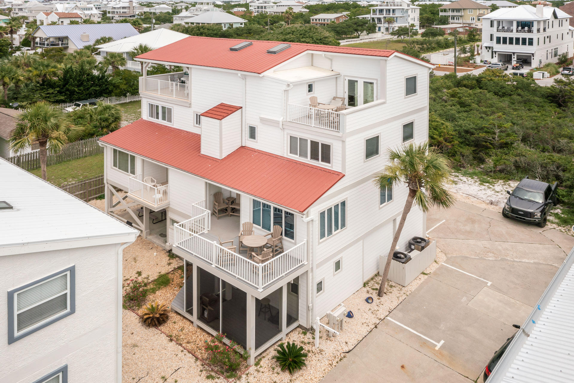 448 West Park Pl Avenue, Unit A1 Inlet Beach, FL 32461 - Photo 2 of 34 an aerial view of multiple houses with a yard