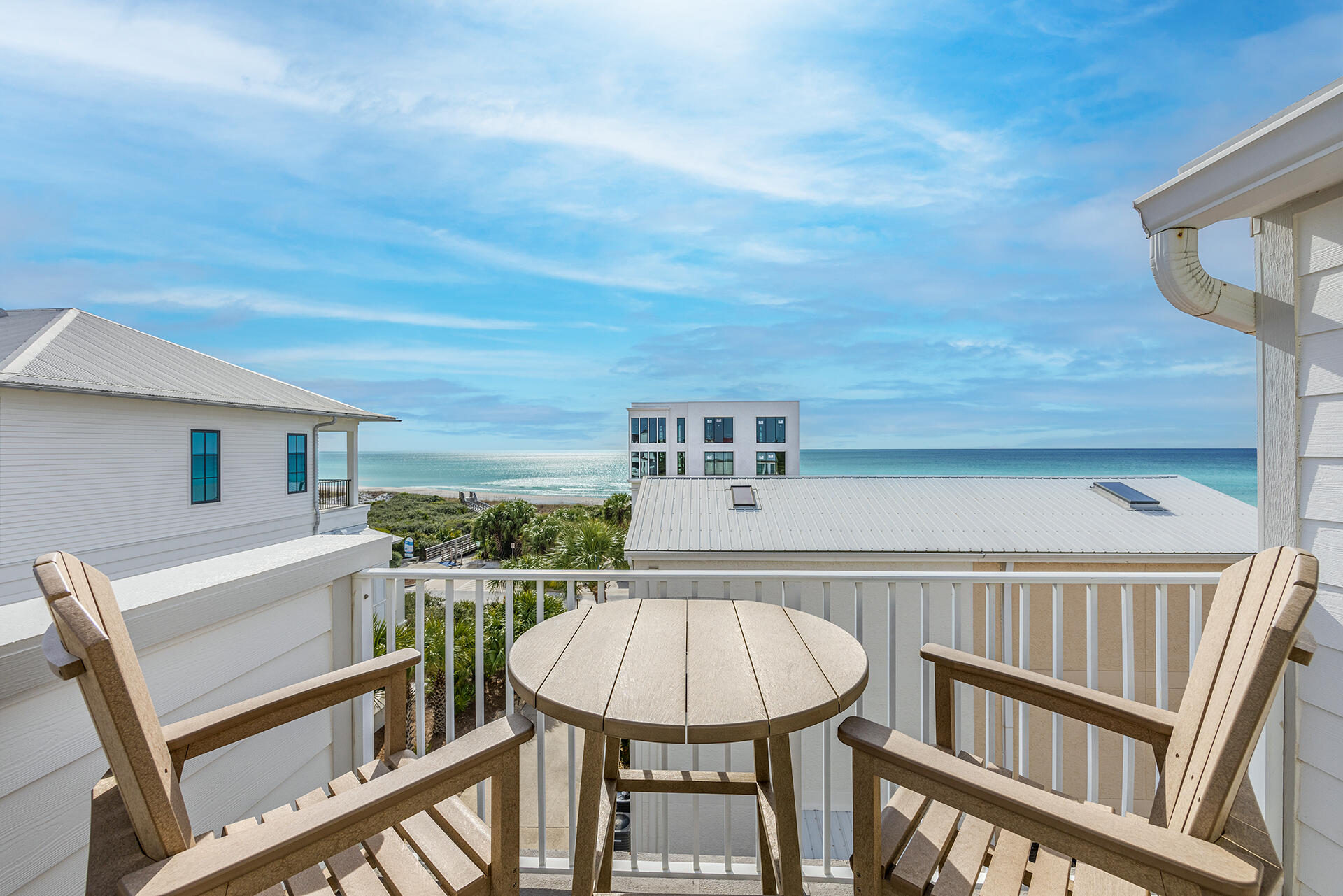 448 West Park Pl Avenue, Unit A1 Inlet Beach, FL 32461 - Photo 22 of 34 a view of a balcony with furniture