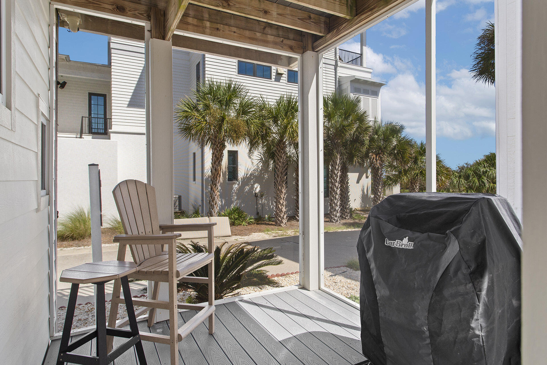 448 West Park Pl Avenue, Unit A1 Inlet Beach, FL 32461 - Photo 31 of 34 a view of a balcony with chairs