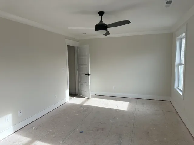 a view of an empty room and window