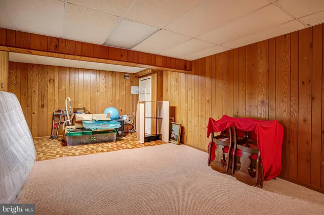 a view of a swimming pool with a yard