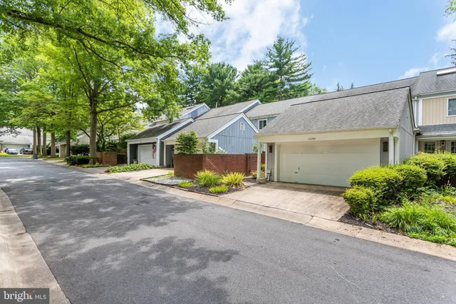 a kitchen that has a stove and a table in it