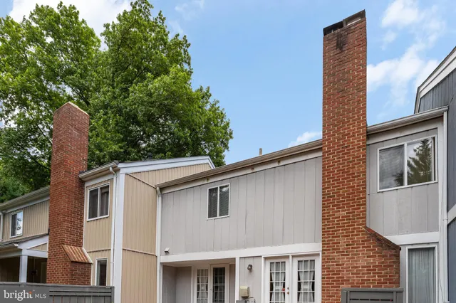 a kitchen with a refrigerator a sink and a refrigerator