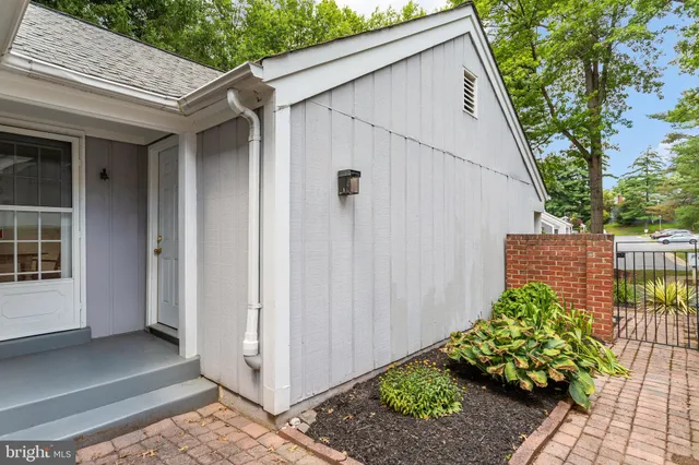 a bathroom with a sink mirror vanity and toilet