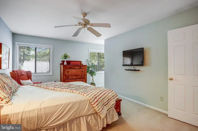 a kitchen with a sink cabinets and window